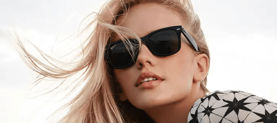 A blonde woman wearing sunglasses